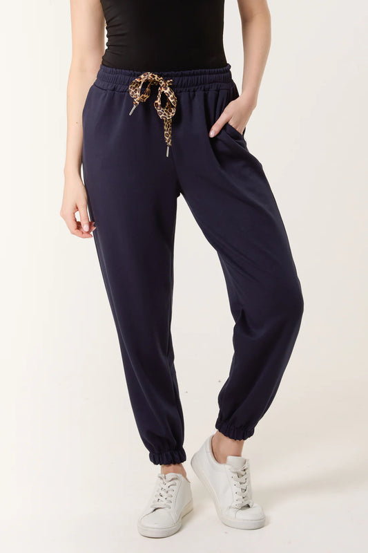 LEOPARD BOW CUFFED JOGGERS - NAVY